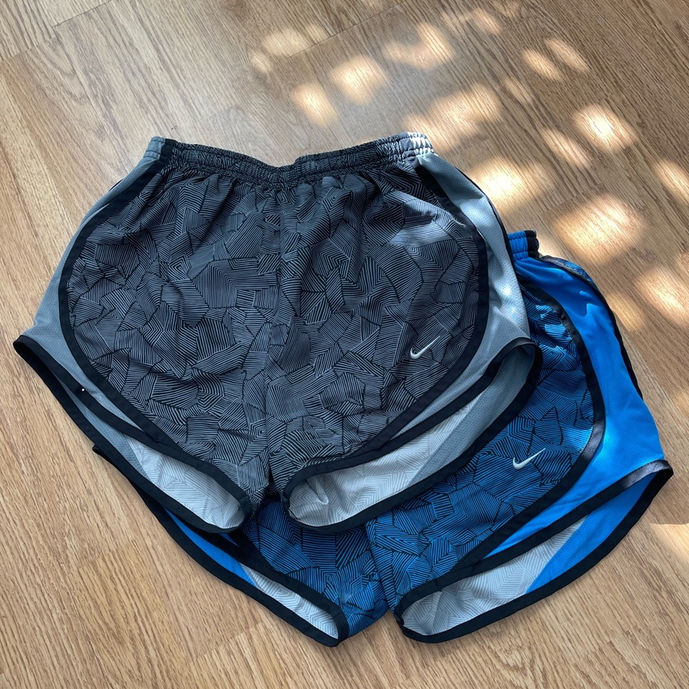 Two pairs of Nike running shorts; size x-small; worn a couple of times